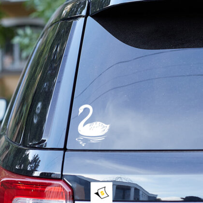 Стикер за кола - Красив Лебед в Езеро Стикер за кола с изображение на красив лебед, плаващ спокойно в езеро. Идеален за любители на природата и елегантния дизайн, изработен от издръжливи материали, устойчиви на атмосферни влияния.